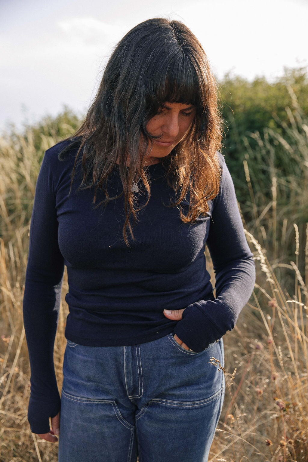 Thumbholes | Norah is wearing size Medium, height 5.6"