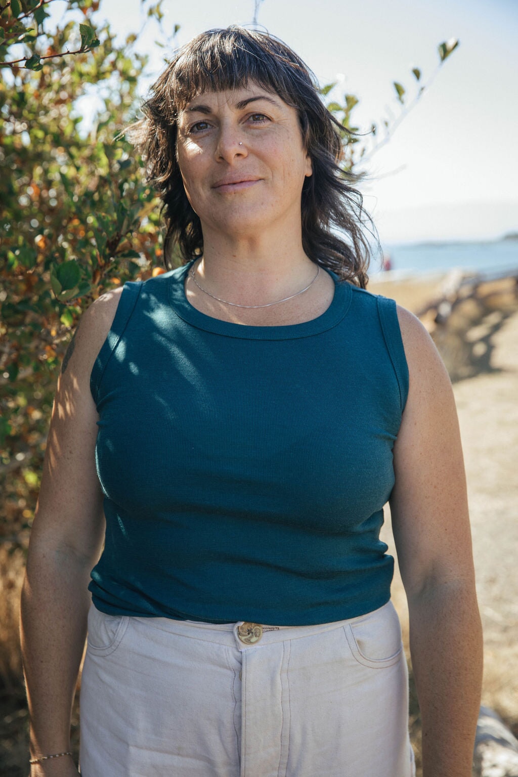Undershirt | Norah is wearing size Large, height 5.6"